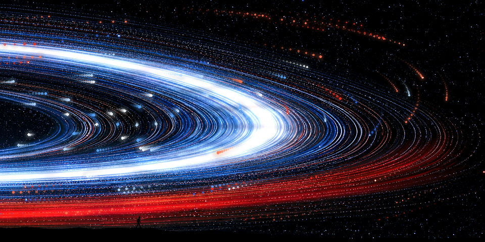 Blue, white, and red particle trails from an orbital-background experiment.